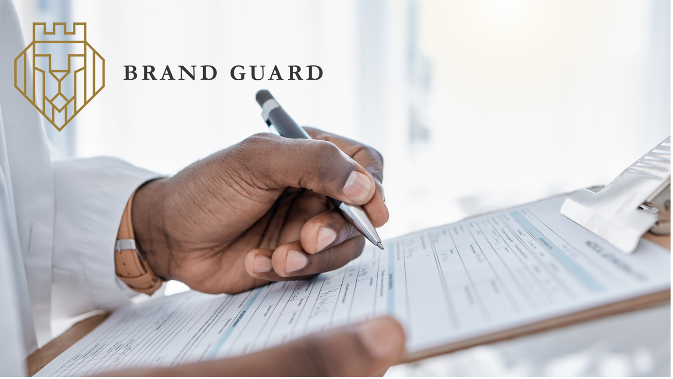 Person filling out compliance documentation on a clipboard with the Brand Guard logo, representing POPIA-compliant secure document destruction and regulatory accountability.